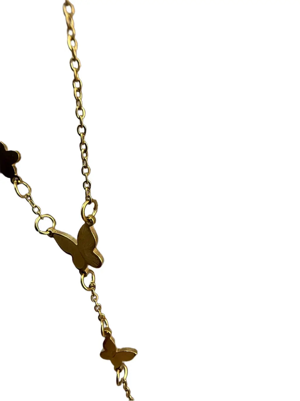 Gold necklace with butterfly pendants